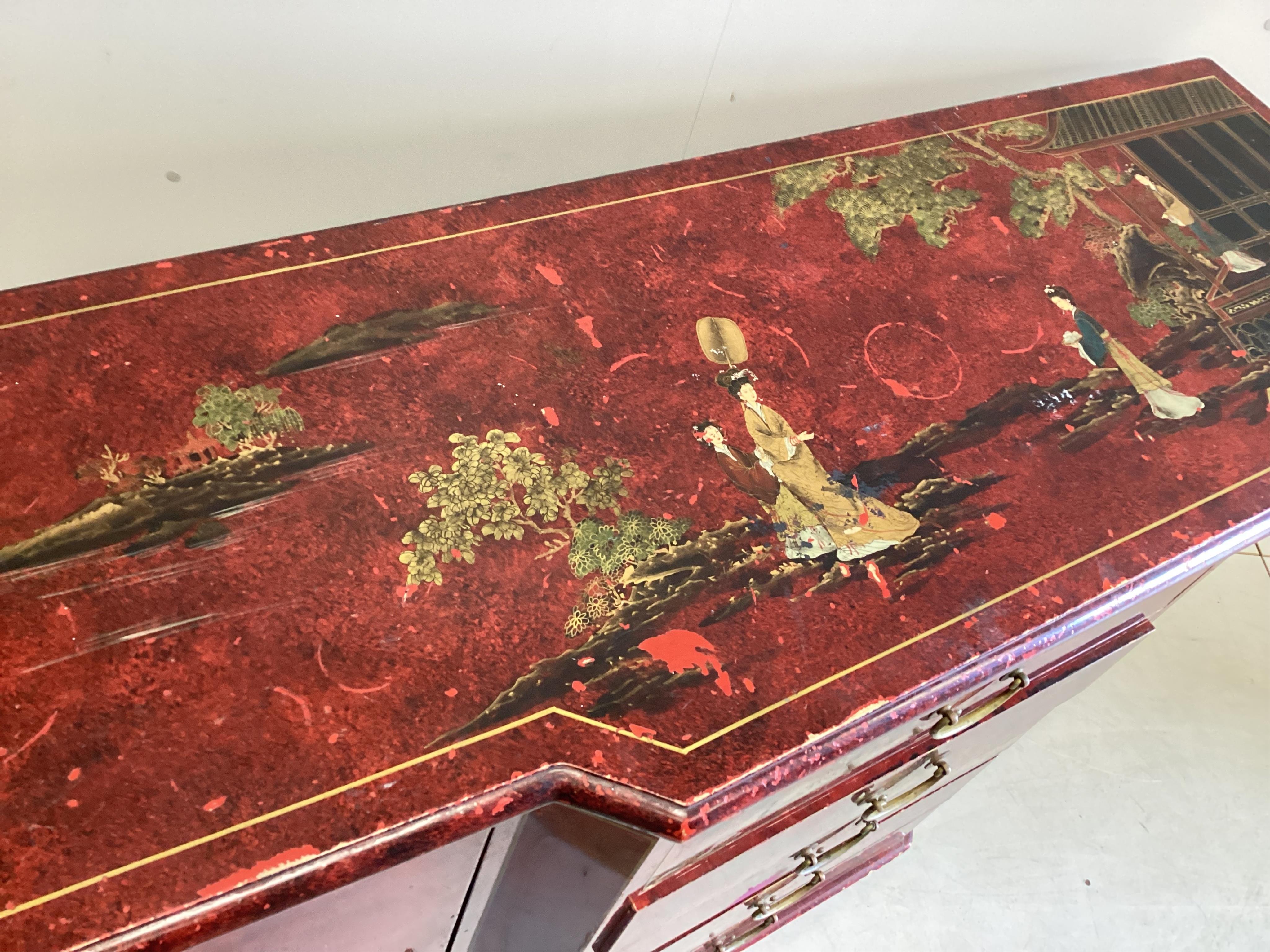 A chinoiserie lacquer breakfront side cabinet, width 142cm, depth 48cm, height 86cm. Condition - poor-fair